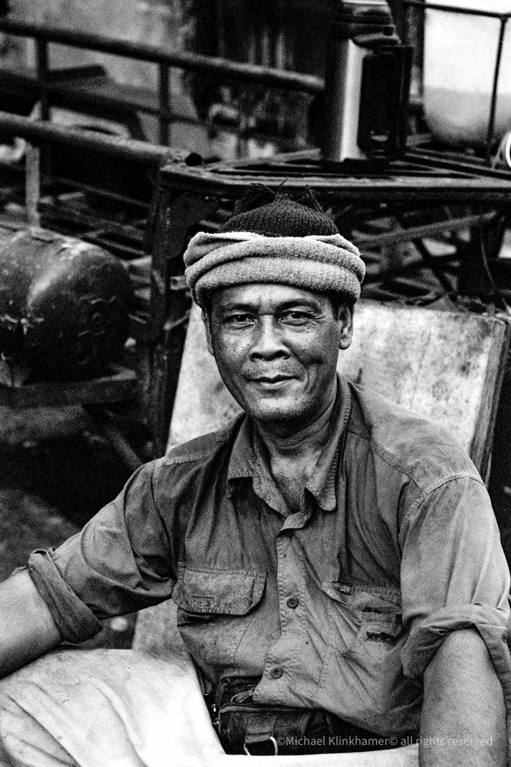 Portrait of a Cambodian man in a headscarf, black and white
