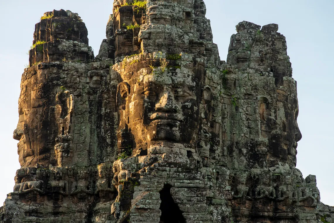 The carved stone faces of the Bayon temple at Angkor Thom